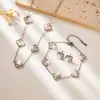 Conjunto Popular de Trébol de Cuatro Hojas Transfronterizo Pulsera y Collar de Acero Inoxidable Joyería de Lujo de Nicho Estilo Europeo y Americano