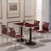 Juegos de mesa y sillas, diseñados específicamente para cafeterías escolares, restaurantes, tiendas de té de burbujas y establecimientos de comida rápida.; mesas y sillas de comedor sencillas de grado comercial