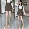 Falda para Mujer 2026 Otoño/Invierno Nueva Falda Corta de Cuero PU Anti-Exposición Cintura Alta Adelgazante Falda de Línea A Falda de Cuero Mate