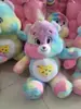 Explotaciones transfronterizas muñeco oso arcoíris carebears tie-dye muñeco oso colorido muñeco infantil fabricantes de muñecos al por mayor