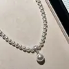 Collar Princesa Diana de plata de ley 925 con perlas Swarovski y diamantes en forma de T, estilo retro francés, con colgante de lujo de alta gama con incrustaciones de diamantes y cadena para clavícula.