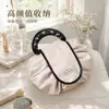 Bolsa de maquillaje perezosa de nuevo estilo para mujer, bolsa de almacenamiento de viaje de gran capacidad, bolso plano con cordón para viajes al aire libre y neceser