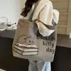 Bolsa de Lona Grande de Capacidad Casual para Mujer 2026 Nuevo Estilo de Moda Bolso de Mano para Salir Bolsa de Compras Bolso de Hombro para Viajes Diarios