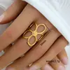 Anillo de acero de titanio ajustable con explosiones transfronterizas al por mayor anillo retro de acero inoxidable con presión de aceite apertura anillo de pareja para hombres y mujeres