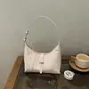 Bolso bandolera artístico de estilo coreano para mujer, nuevo modelo 2026, popular este año, adecuado para ir al trabajo, bolso tipo albóndiga de un solo hombro cruzado