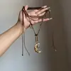 Collar Vintage de Estrella y Luna Metal Retro Desgastado Cadena Larga de Suéter de Alto Valor Gargantilla Apilada Multicapa