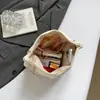Bolso de mujer de alta gama, nuevo para la primavera de 2026, bolso de axila para el trabajo, bolso de hombro cruzado con diseño de nicho, moderno y simple