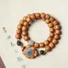 Barbie sándalo viejo Xiangfeng nueve colas hada Buda cuentas pulsera vintage Estilo nacional Buda cuentas hombres y mujeres suéter collar al por mayor