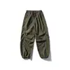 Conjunto Externo Três Provas Frota Negra: Conjunto de Duas Peças: Jaqueta com Gola Alta e Capuz Escondido e Calça Wide-Leg Patchwork Workwear