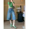 Jeans feminino cropped de perna larga estilo retrô americano, calça fina de seis pontos de comprimento médio de cintura alta emagrecedora solta reta para o verão de 2026