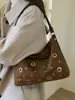 Bolsas Pequeñas Retro Otoño e Invierno para Mujer 2025 Nuevo Versátil para Viajes Diarios Bolso Cruzado de Hombro a la Axila de Moda Bolso Cubo