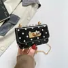 Cierre de Candado Bolso de Mujer 2026 Nueva Tendencia de Moda Lunares Bolso de Mano Pequeño Elegante Bolso Cruzado de Hombro con Textura