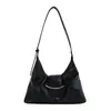 Bolso bandolera francés de nicho para mujer 2026 nuevo elegante simple de un solo hombro de alta gama versátil