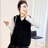 Chaleco de punto con capucha para mujer, nuevo estilo otoño/invierno 2026, prenda exterior de corte holgado, chaleco suéter para superponer, moderno