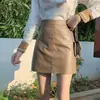 Falda de línea A 2026 otoño nuevo falda corta de cuero falda midi estilo primavera y otoño falda ajustada a la cadera para mujer cintura alta PU falda corta de otoño e invierno