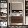 Conjunto de gabinete de baño estilo mediados de siglo de madera de nogal y aluminio de panal, incluyendo un lavabo de cerámica y tocador para el baño