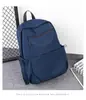 Mochila masculina moderna com toque de qualidade, grande capacidade, leve e à prova d'água, 2026 mochila casual de cor sólida para o dia a dia e para laptop