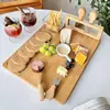 Tábua de queijo de bambu personalizada para uso doméstico, tábua de frutas de mesa multifuncional, bandeja de queijo de bambu com faca e garfo