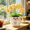 Muñecas de plantas tejidas a mano transfronterizas, decoraciones de plantas tejidas, flores artificiales de ganchillo para fiestas