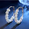 Pendientes de botón de flor de tulipán con pasador de plata 925 para mujer, de alta gama, personalidad, más fáciles de combinar, moda nicho, pendientes de lazo, venta al por mayor
