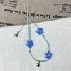 Cadena para teléfono móvil con cuentas de estrellas de colores, color melocotón, caqui, ruyi, colgante popular de dopamina para mujer.