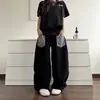 Calça jeans patchwork estilo retro americano com estampa de leopardo para homens, novo estilo com decoração de rebites, calça larga de perna larga estilo high street com corte curvo