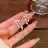 Aretes de lazo de cinta de diamantes brillantes para mujer, temperamento dulce, aretes de alto sentido, Corea del Sur, Joker, explosiones, joyería para la oreja al por mayor