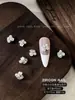 Perla Flor Blanca Pequeña Pedrería Decoraciones para Uñas Ovaladas Ojo de Caballo Pequeño Aleación de Perla Pedrería para Uñas Hecha a Mano Venta al por Mayor