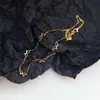 Moda Europea y Americana Múltiples Lazos Cadena de Clavícula Titanio Acero para Mujeres, Moda de Nicho de Lujo Ligero, Cadena Versátil Transfronteriza para Clavícula