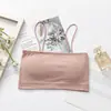 Top de punto acanalado sin tirantes cruzado, estilo popular sin costuras en el sudeste asiático, camisola pequeña para niñas, chaleco anti-exposición para estudiantes, versátil