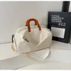 Bolsa de Fitness de Moda para Mujer 2025 Nuevo Modelo Bolsa de Viaje de Gran Capacidad Bolsa de Almacenamiento Ligera Se Puede Llevar Cruzada o en la Mano Bolsa de Equipaje Moderna