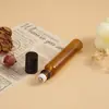 Botella de vidrio ámbar opaca con tapa negra, frasco para aceites esenciales, frasco dispensador de muestras de perfume, botella vacía cosmética portátil al por mayor