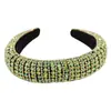 Diadema ancha de pedrería europea y americana