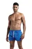Nuevos pantalones de fitness de verano transfronterizos europeos y americanos para hombre, cómodos, transpirables, de color sólido, para correr, deportes de ocio y entrenamiento.