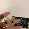 Aretes de Ojo de Tigre 'Fuegos Artificiales Dorados' para Mujer, Aretes de Diseño Único de Nicho para Otoño e Invierno, Lujo Ligero con un Toque de Alta Gama