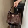 Bolsa Fosca Retrô Outono e Inverno Feminina 2026 Novo Estilo Moda para o Dia a Dia Bolsa de Ombro Único Transversal Bolsa de Mão de Alta Qualidade