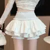 Falda elástica negra para mujer, nueva colección primavera/verano 2026, corte A, ajustada y acampanada, adecuada para figuras petite