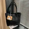 Bolso de Mano Grande de Textura para Estudiantes Viajeras para Mujer 2025 Otoño e Invierno Nuevo Bolso Tote de Hombro Casual Elegante de Nicho
