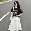 Roupa Infantil Estilo Coreano Verão Novo Estilo Camiseta Fofa para Meninas Estampa de Cogumelo Manga Curta Saia Branca com Laço Conjunto Casual