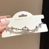 Elegante y genial pulsera con colgante en forma de diamante incrustado con diamantes de estilo forestal, un accesorio de lujo de alta gama para mujer