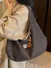 Bolsa de tecido de grande capacidade feminina outono e inverno 2026 nova bolsa de lona versátil bolsa de ombro único estilo preguiçoso bolsa tote para o dia a dia