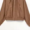 Ins estilo europeo y americano 2026 nueva moda temperamento mujeres al por mayor cuello redondo manga larga color liso camisa top de trabajo