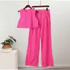 Conjunto de dos piezas para mujer transfronterizo nuevo, color liso, top tipo chaleco de cuello redondo, pantalones acampanados, traje de pantalones simple, moderno y chic