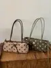 Bolso de Hombro con Lunares de Moda Coreana para Mujer 2026 Nuevo Bolso de Mano de Nicho Dulce para el Trabajo Bolso Tote de Hombro Único de Gama Alta