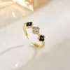 Anillo Abierto de Trébol de Cuatro Hojas de la Suerte Full Diamond que Gotea Aceite para Mujer Estilo Europeo y Americano Ins Lujo Accesible Anillo Elegante que No Se Desvanece