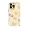 Artículo Caliente de TikTok Funda para Teléfono Estilo Lujo Ligero Francés Moño Colorido iPhone18promax Funda de Película de Capa Única