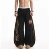 Pantalones de chándal casuales holgados de pierna ancha con estampado de leopardo, estampado de letras y rayas, estilo callejero americano, subcultura, para hombres y mujeres