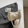 Moda Nova Primavera 2026 Cor Sólida Casual Simples Grande Capacidade Bolsa de Ombro Transversal Bolsa de Axila Bolsa de Mão para Mulheres