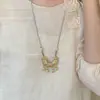 Nueva Cadena de Suéter de Bola de Metal Esmaltada Estilo Chino Flor de Loto para Mujer, Moda Retro Estilo Nacional, Cadena de Cuello de Cuerda Trenzada Exquisita de Alta Gama