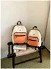 Mochila Infantil Color-blocking Ultraleve Casual Versátil Patchwork Dopamina Mochila de Estudante para Meninos e Meninas Mochila Escolar para Exterior